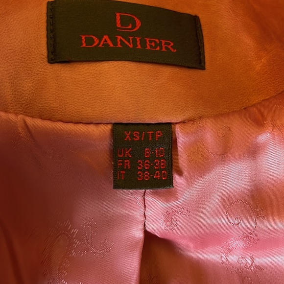 Danier pink leather jacket.  Lightly worn.    Marks as detailed in photos.  XS - Picture 9 of 9